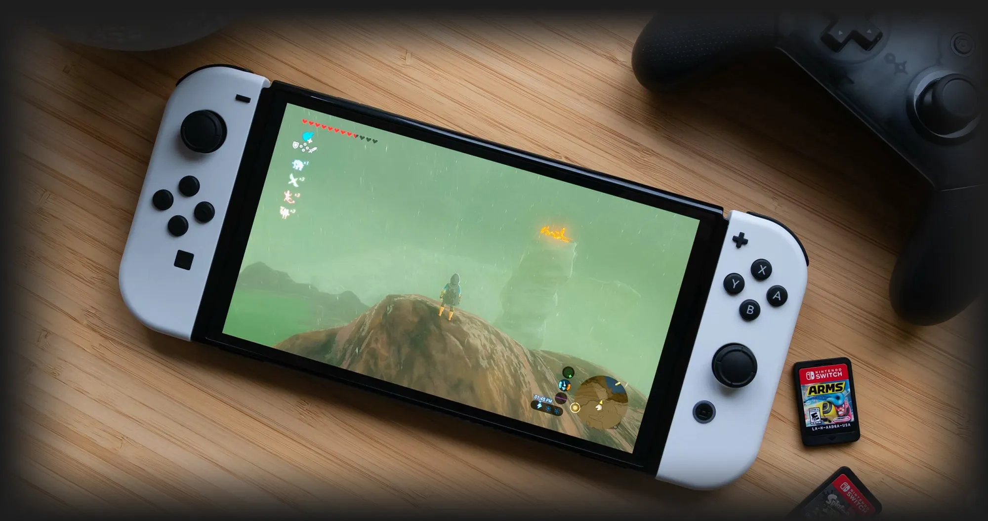 Портативна ігрова приставка Nintendo Switch OLED with White Joy-Con (045496453435)