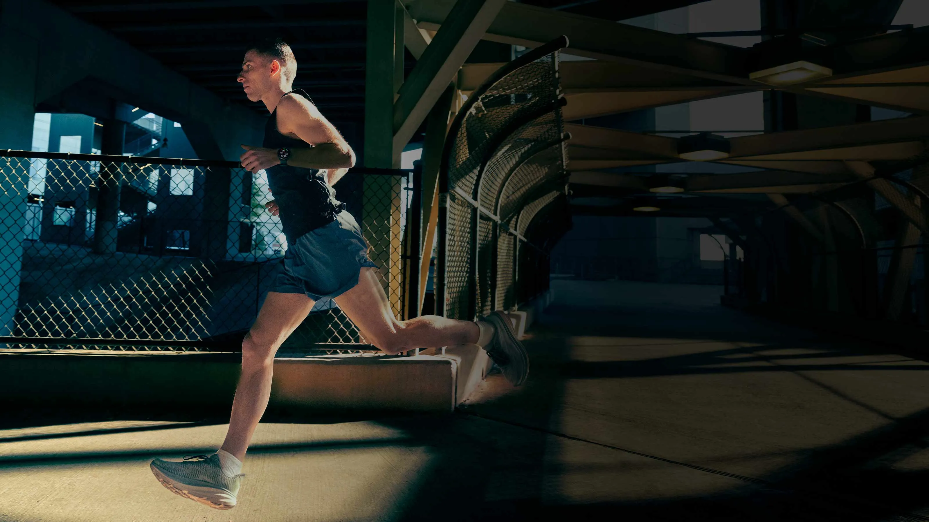 Garmin Forerunner 970 Carbon Gray DLC Titanium with Black Case and Black/Translucent Whitestone Band