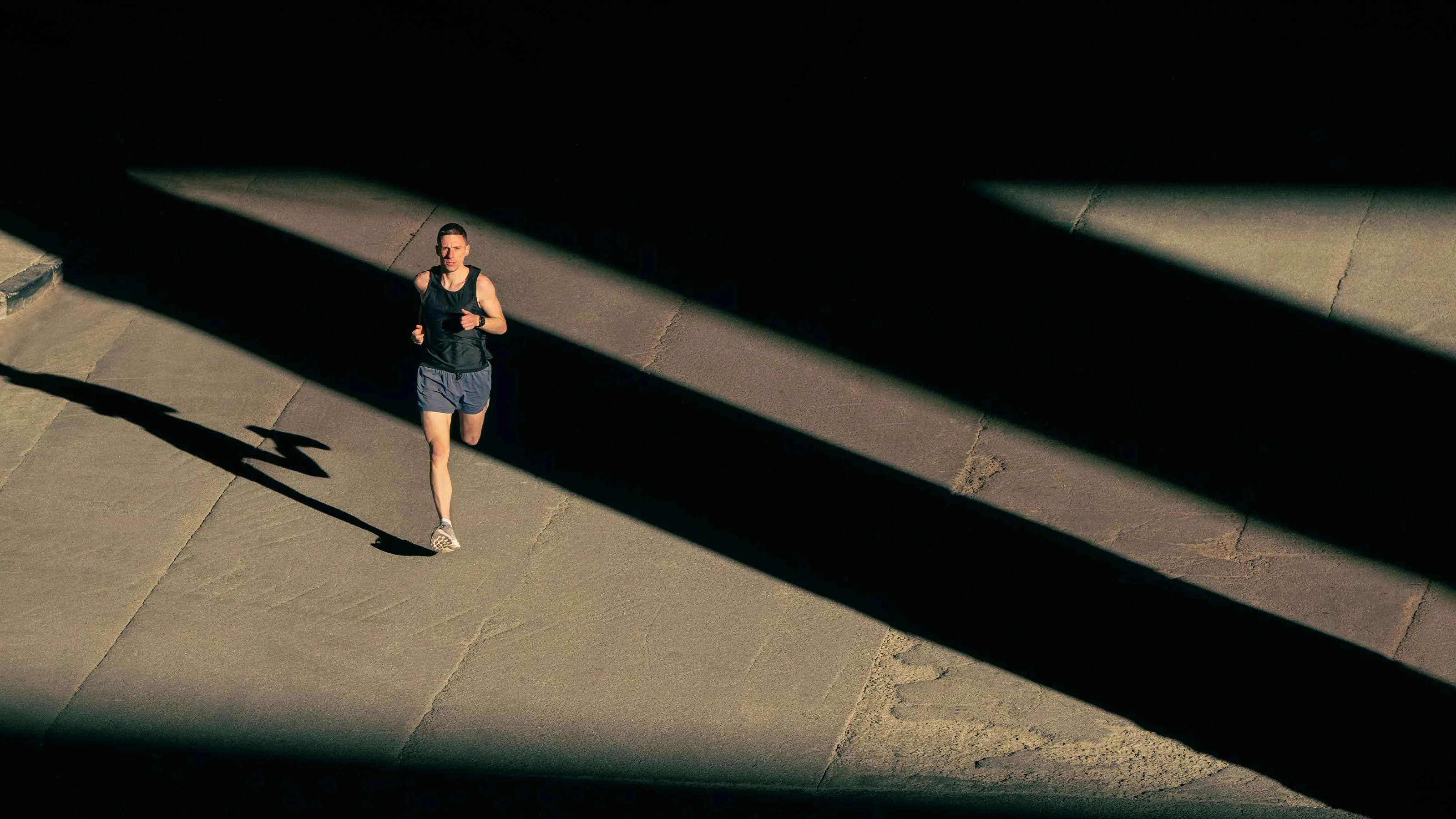 Garmin Forerunner 970 Carbon Gray DLC Titanium with Black Case and Black/Translucent Whitestone Band