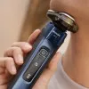 Электрическая бритва Philips Series i9000 Prestige SkinIQ (Dark Blue/Black)