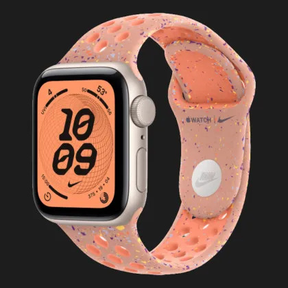Apple Watch SE 3 GPS, 40mm Starlight Aluminum Case with Alpenglow Pink Nike Sport Band (S/M)